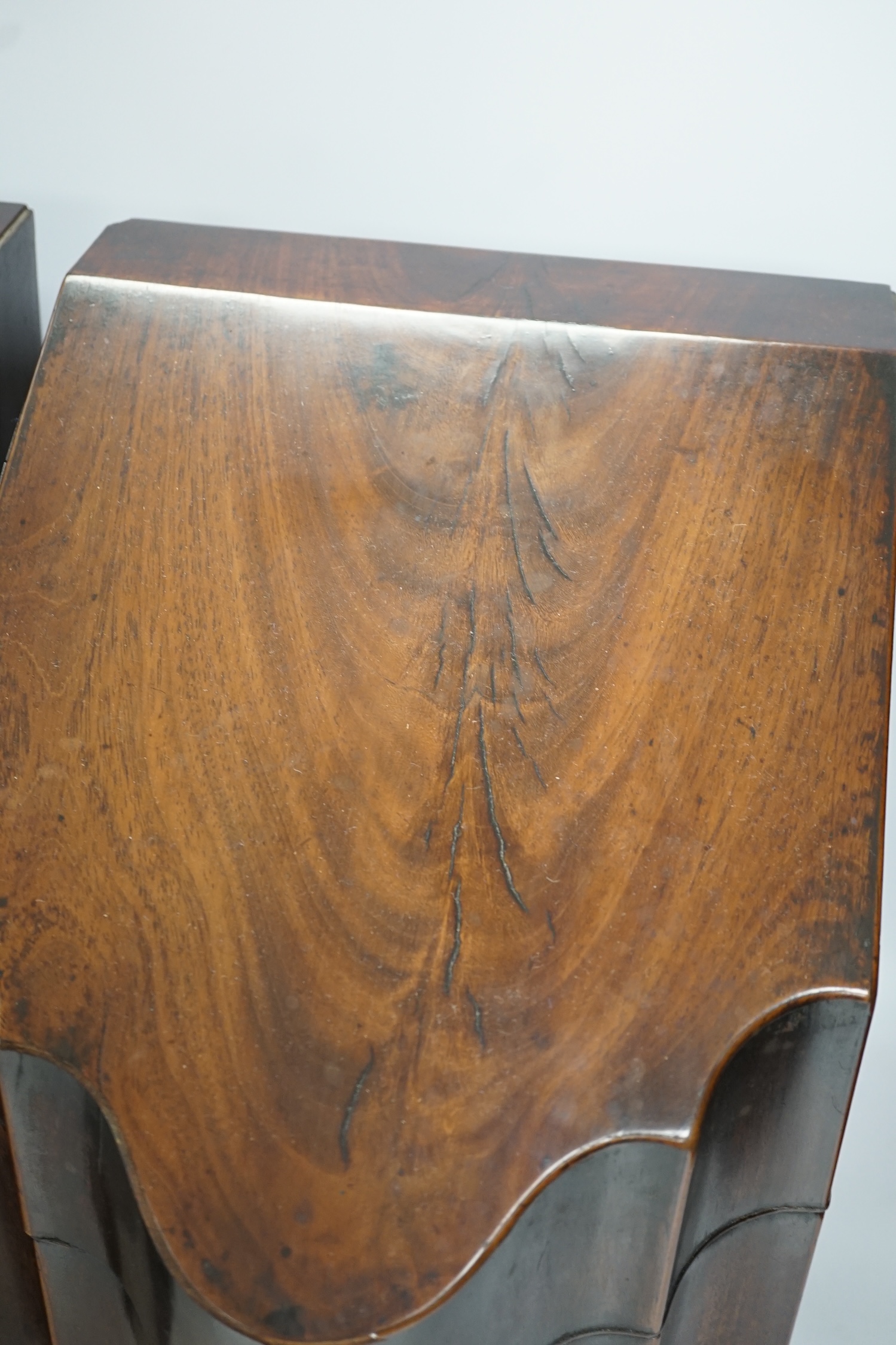 A pair of George III mahogany knife boxes, 37cm tall. Condition - poor to fair